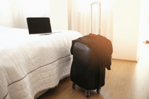 Hotel Room with Suitcase